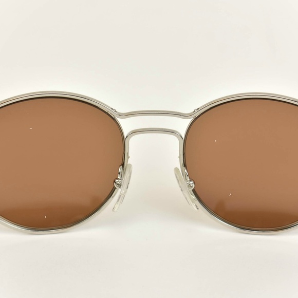 PRADA: Silver, Metal & Logo Sunglasses (po) - Picture 8 of 8